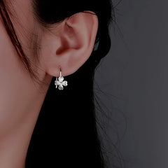 Angled view of the Sterling Silver Four-Leaf Flower Ear Hooks