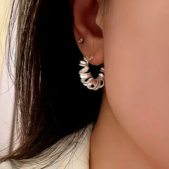 Close-up detail of the sparkling zircons and plating on the Frosted Wire Earrings