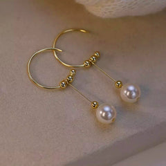 Angled view of the Sterling Silver Geometric Bead Earrings