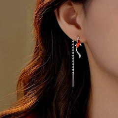 Model showcasing the dangle and style of the Sterling Silver Gold Fish Threader Earrings