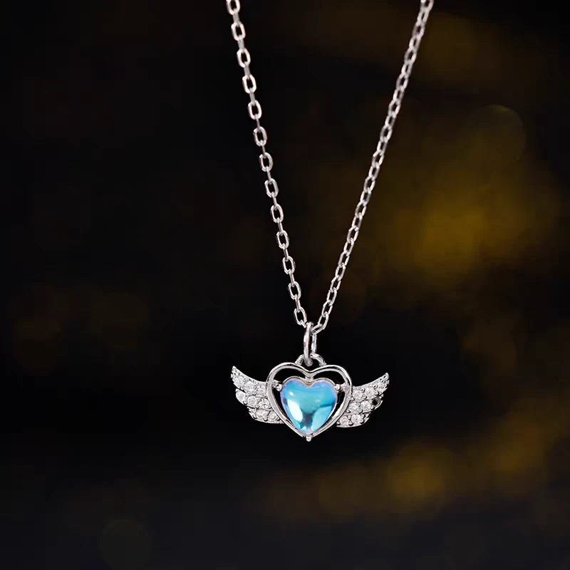 Sterling Silver Heart Angel Wing Necklace worn to showcase its length and pendant detail