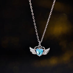 Sterling Silver Heart Angel Wing Necklace worn to showcase its length and pendant detail