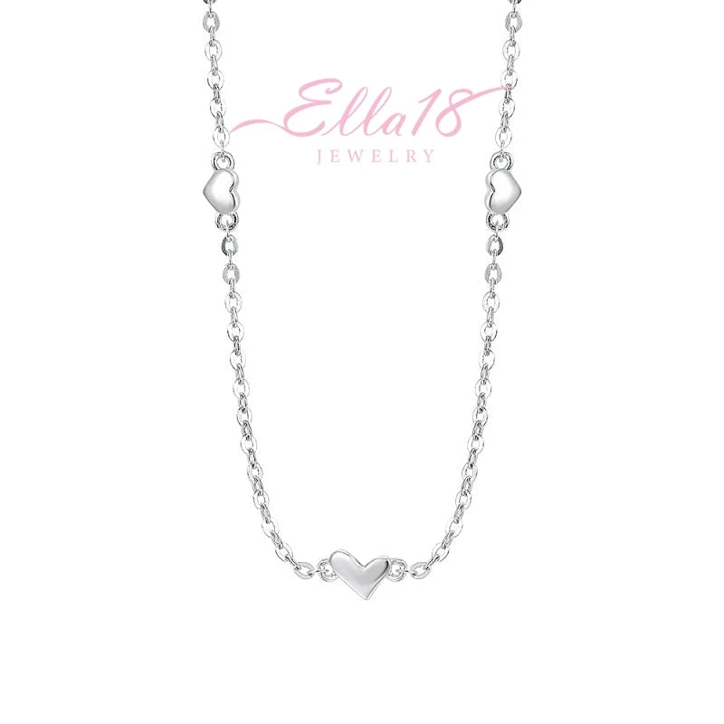 Close-up of the pendant and clasp on the Dainty Heart Necklace