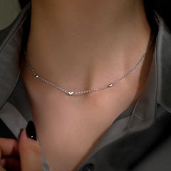 Detailed view of the Sterling Silver Heart Necklace chain and pendant