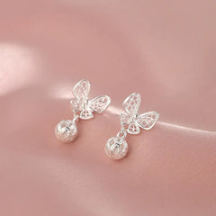 Angled view of the Sterling Silver Hollow Butterfly Earrings