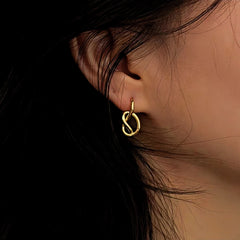 Close-up detail of the sparkling zircons and plating on the Heart Ear Hook