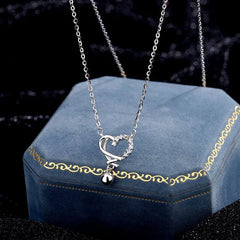 Detailed view of the Sterling Silver Hollow Heart Necklace chain and pendant