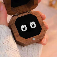 Close-up detail of the sparkling zircons and plating on the Bear Stud Earrings