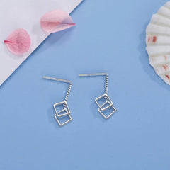 Close-up detail of the sparkling zircons and plating on the Arrow Heart Necklace