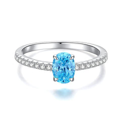 Close-up view of the gemstone and setting of the Red Apple Necklace