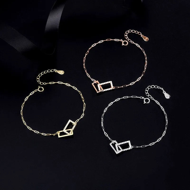 Model wearing the Sterling Silver Interlocking Bracelets to highlight its design on the wrist