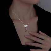 Sterling Silver Lotus Tassel Necklace - beautiful Heart Hoop Earrings