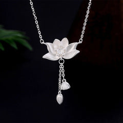 Close-up of the pendant and clasp on the Heart Hoop Earrings