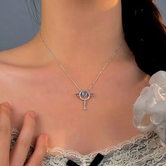 Close-up of the pendant and clasp on the Kitten Threader Earrings