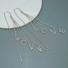 Close-up detail of the sparkling zircons and plating on the Leaf Pearl Earrings