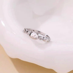 Close-up view of the gemstone and setting of the Puppy Stud Earrings