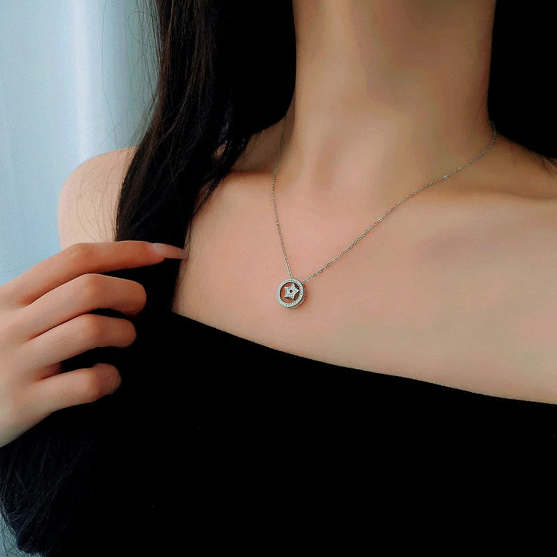 Close-up of the pendant and clasp on the Double Ring Necklace