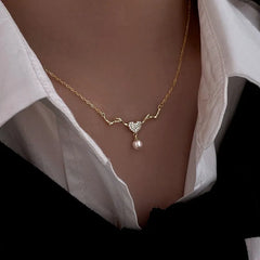 Sterling Silver Luxury Elk Diamond Heart Pearl Necklace worn to showcase its length and pendant detail