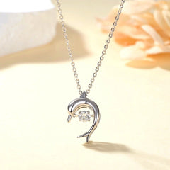 Detailed view of the Sterling Silver Luxury Moving Zircon Dolphin Necklace chain and pendant