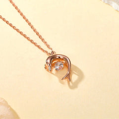 Close-up of the pendant and clasp on the Zircon Dolphin Necklace