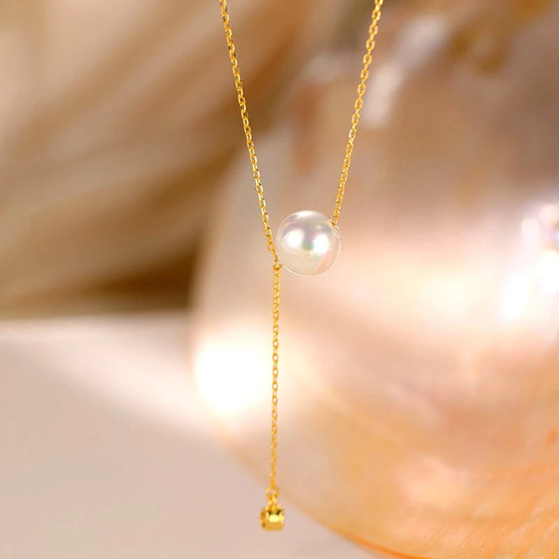 Detailed view of the Sterling Silver Luxury Pearl Tassel Necklace chain and pendant