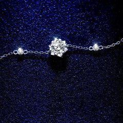 Model wearing the Sterling Silver Luxury Snowflake Moissanite Bracelets to highlight its design on the wrist