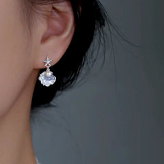 Close-up detail of the sparkling zircons and plating on the Starfish Pearl Earrings