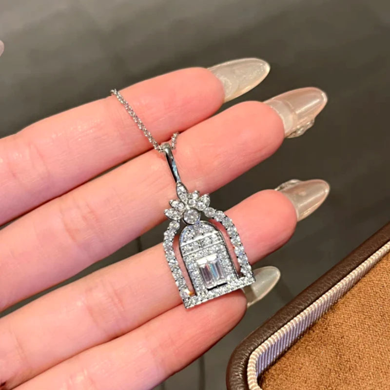 Close-up of the pendant and clasp on the Door of Happiness Necklace