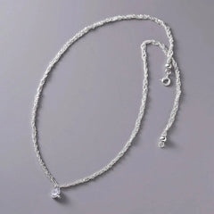 Detailed view of the Sterling Silver Luxury Zircon Multi-Layer Braided Necklace chain and pendant