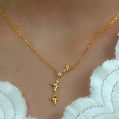 Sterling Silver Luxury Zircon Tassel Butterfly Clavicle Necklace worn to showcase its length and pendant detail