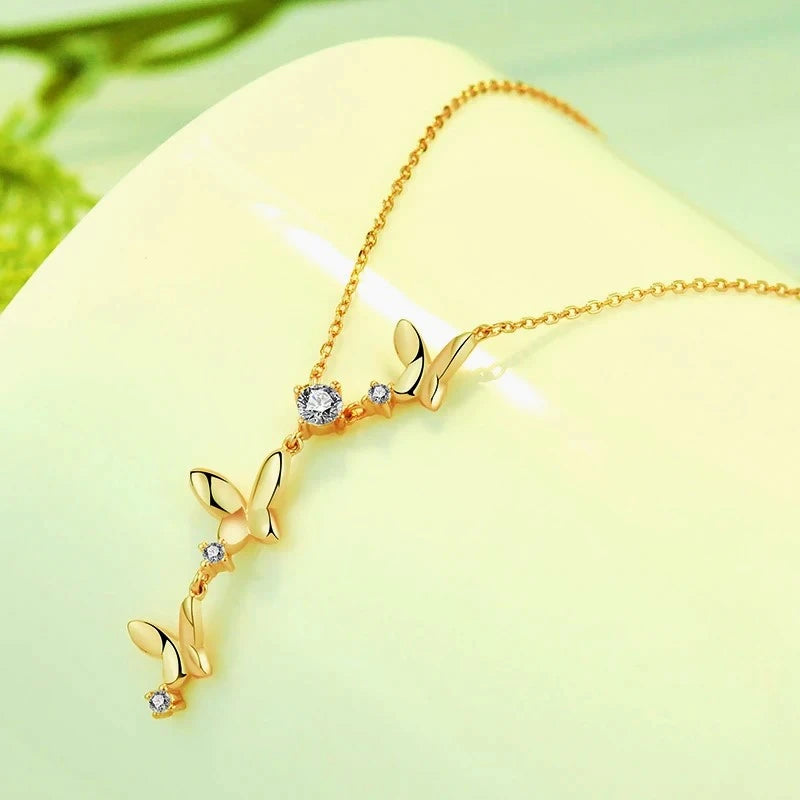 Close-up of the pendant and clasp on the Butterfly Tassel Necklace