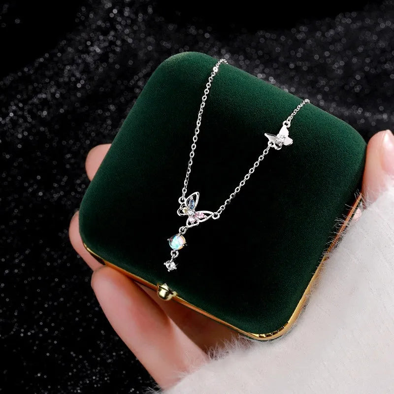 Detailed view of the Sterling Silver Moonstone Butterfly Tassel Necklace chain and pendant