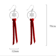 Close-up detail of the sparkling zircons and plating on the Christmas Tassel Earrings