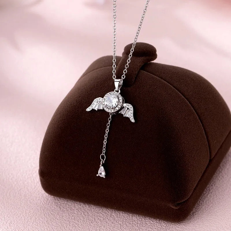 Detailed view of the Sterling Silver Moving Angel Heart Wings Necklaces chain and pendant
