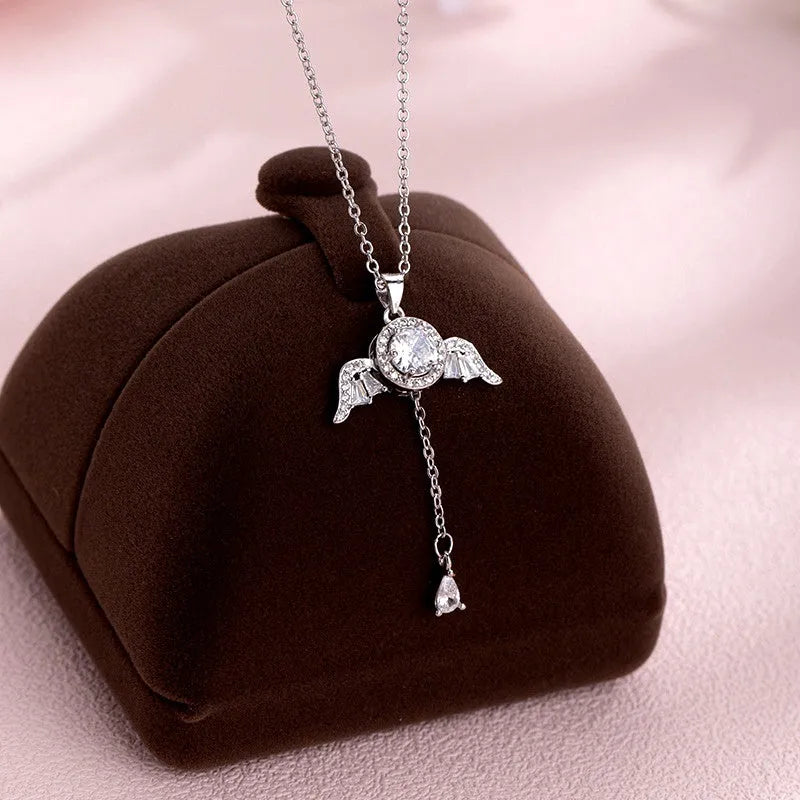 Close-up of the pendant and clasp on the Angel Wings Necklace