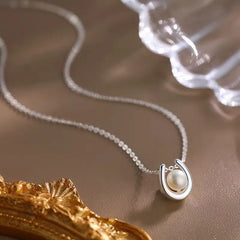Detailed view of the Sterling Silver Natural Pearl Necklace chain and pendant