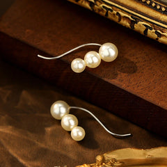 Close-up detail of the sparkling zircons and plating on the Pearl Ear Hook Earrings