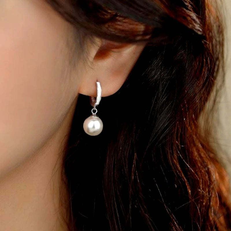 Angled view of the Sterling Silver Pearl Earrings