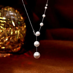 Detailed view of the Sterling Silver Pearl Necklaces chain and pendant