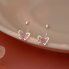 Close-up detail of the sparkling zircons and plating on the Butterfly Ear Jackets