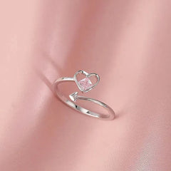Sterling Silver Pink Diamond Heart Rings worn on the hand to show its beautiful fit and design