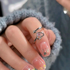 Close-up view of the gemstone and setting of the Pink Heart Ring