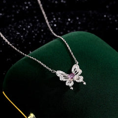 Close-up of the pendant and clasp on the Butterfly Heart Necklace