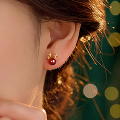 Model showcasing the dangle and style of the Sterling Silver Red Deer Antler Earrings
