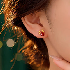 Close-up detail of the sparkling zircons and plating on the Deer Antler Earrings