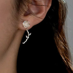 Close-up detail of the sparkling zircons and plating on the Rose Tassel Earrings