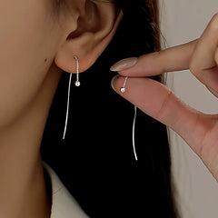 Angled view of the Sterling Silver Round Bead Threader Earrings