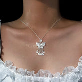 Sterling Silver S999 Sweet Flower Butterfly Tassel Earrings - beautiful Butterfly Tassel Necklace (*Correction: Handle and original tags imply necklace, not earrings*)