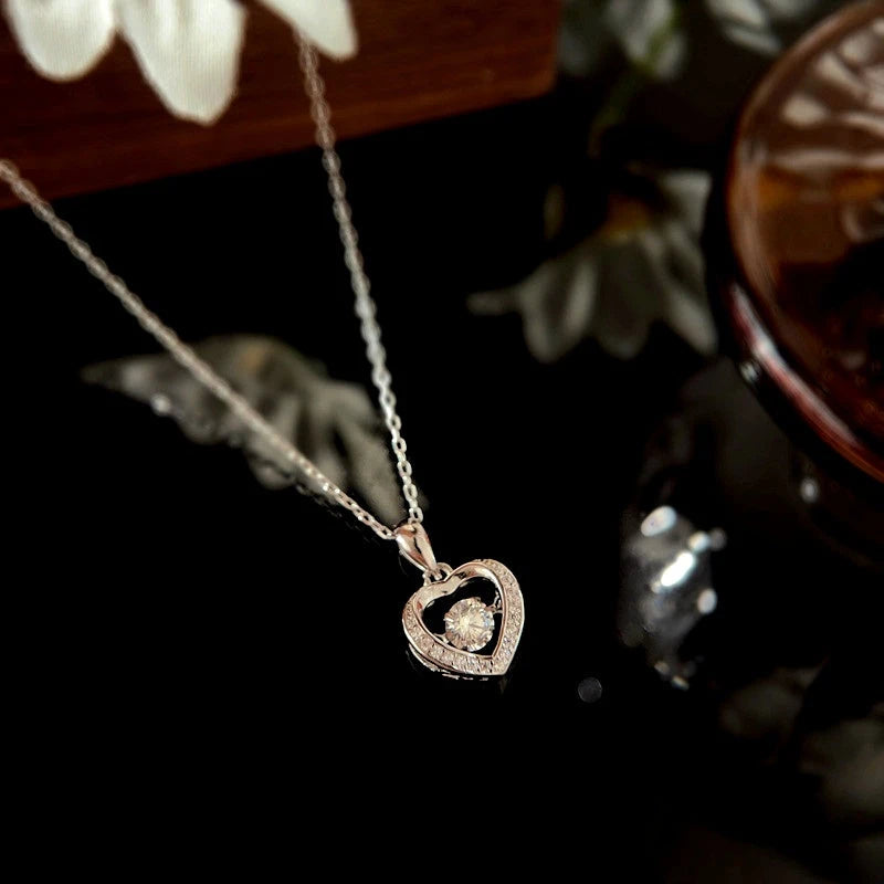 Close-up of the pendant and clasp on the Beating Heart Necklace
