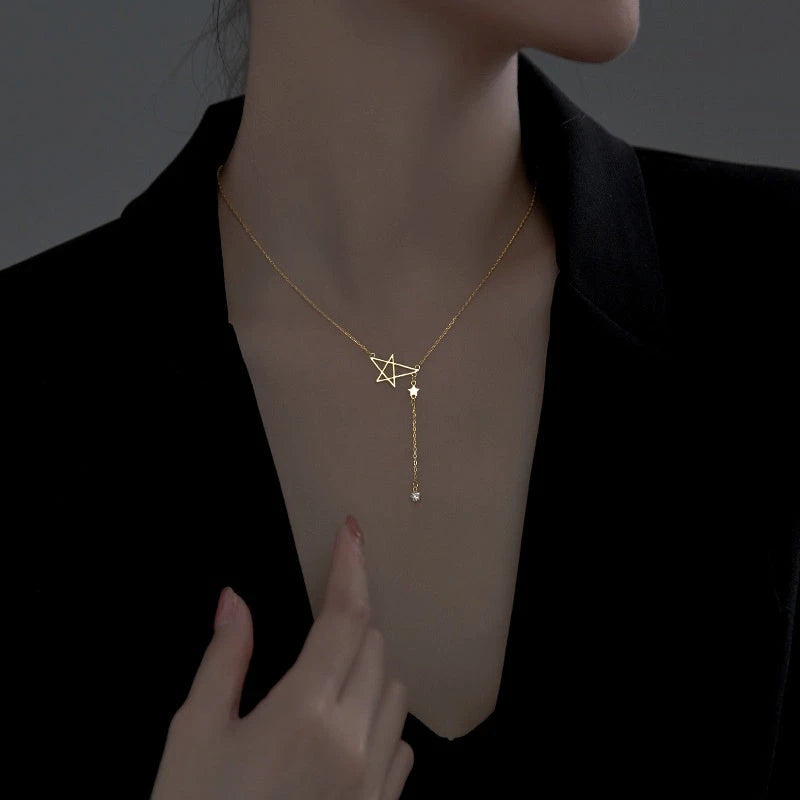 Sterling Silver Simple Star Tassel Necklace worn to showcase its length and pendant detail